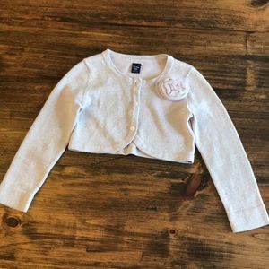 Baby Gap shrug-style sweater.